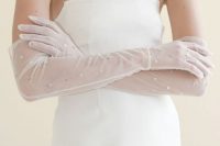long sheer bridal gloves with shiny stars are amazing to make your look outstanding, even if you have a very simple dress
