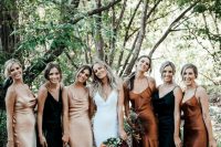 lovely blush, rust and black slip midi bridesmaid dresses and black lace up heels for a boho fall bridesmaid dress