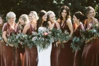 luxurious rust velvet maxi bridesmaid dresses with mismatching designs are very chic for a fall boho wedding