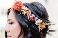messy wavy short hair accented with a bold floral crown is a lovely idea for a fall bride or bridesmaid