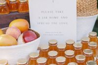 mini honey jars and fresh fruit are perfect fall wedding favors, those who don’t like sweets, will choose fruits