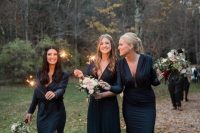 mismatching navy bridesmaid maxi dresses with deep necklines and long sleeves are amazing for an elegant fall wedding