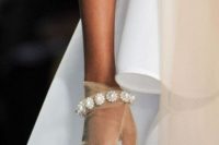 sheer tan gloves with heavy embellishments will make your look more refined and bold