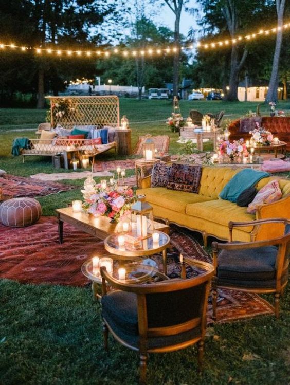 string lights paired with candle lanterns and candleholders are amazing to illuminate your wedding lounger or reception space