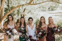 very cool slip maxi bridesmaid dresses in deep purple, rust, green and nude are perfect for a relaxed and chic fall wedding