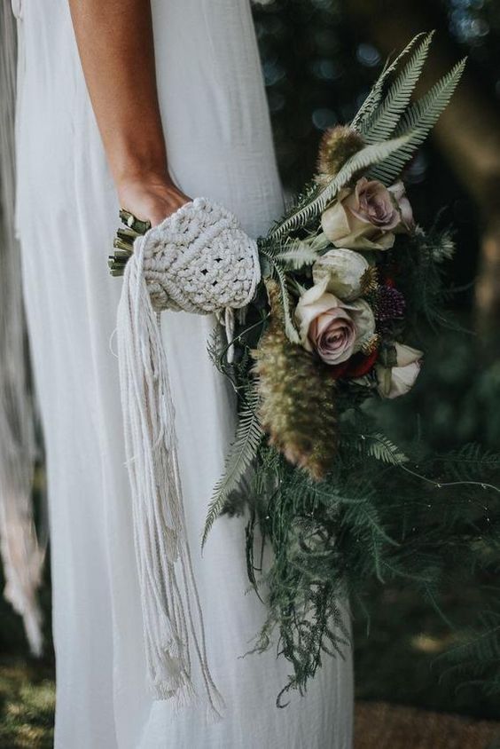 a macrame bouquet wrap is a veyr popular idea to go for, try long fringe if you want