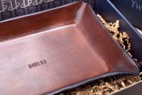 a monogrammed leather tray for small accessories and stuff is a cool groomsmen gift idea for anyone and is not hacky