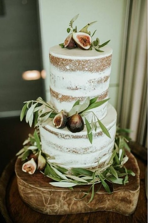 a naked fig and olive leaf wedding cake for a Tuscany wedding or a natural fall wedding