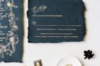 black wedding invites with a raw hem and gold calligraphy are perfect for a gothic wedding