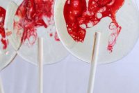 bloody lollipops are a budget-friendly idea for Halloween – make as many as you want yourself