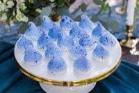 electric blue meringue kisses are a lovely and very bold idea for a wedding, place them on an elegant stand