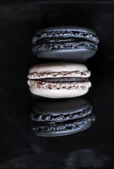 gorgeous black and black and white macarons are timeless wedding favors, these colors are perfect for Halloween