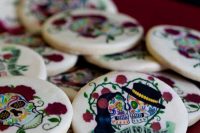 hand painted sugar skull wedding cookies is atasty favor idea and a delicious dessert