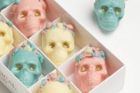 lovely pastel and gold glitter chocolate skulls will be delightful and cool Halloween wedding favors