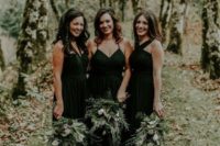 mismatching black maxi bridesmaid dresses are great for a soft gothic and many other weddings, too