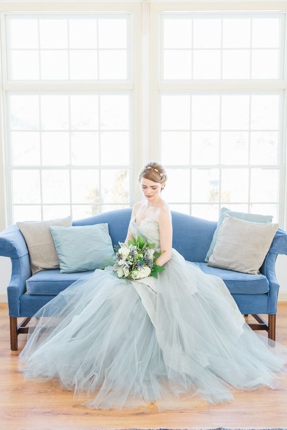 a beautiful ice blue strapless wedding dress with an embellished bodice and a layered tulle skirt is just wow