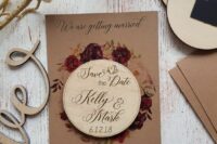 a bright wedding save the date of kraft paper, with a wooden save the date and calligraphy and bright blooms