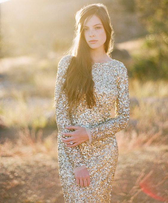 a chic and classic gold sequin sheath wedding dress with a high neckline and long sleeves is a timeless idea for NYE