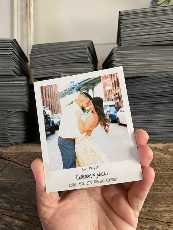 a cool colored Polaroid save the date magnet with a couple's photo is a lovely and bright idea for a modern wedding