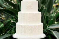 a fantastic white cable knit wedding cake with no other detailing is a perfect idea for a snowy or mountain wedding