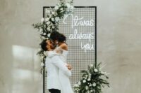 a lovely wedding backdrop with blooms