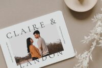 a neutral save the date with a colored couple’s photo and black printing is a cool and bold idea for a wedding