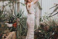 a romantic crochet mermaid wedding dress with thick straps and an open lace up back is a very creative idea for a boho bride