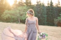 a unique purple draped wedding dress, a tender blush and lavender wedding crown and a romantic lavender and blush wedding bouquet