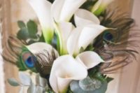 a unique wedding bouquet with white callas,peacock feathers and pale eucalyptus plus a turquoise wrap