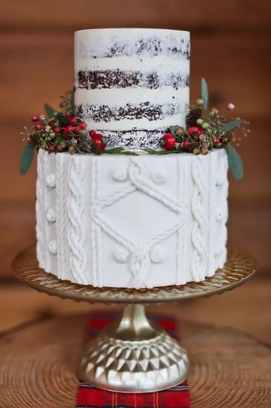 a wedding cake with a cable knit tier and a naked top, with pinecones, berries and foliage