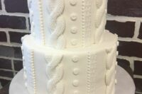 an all-white winter wedding cake