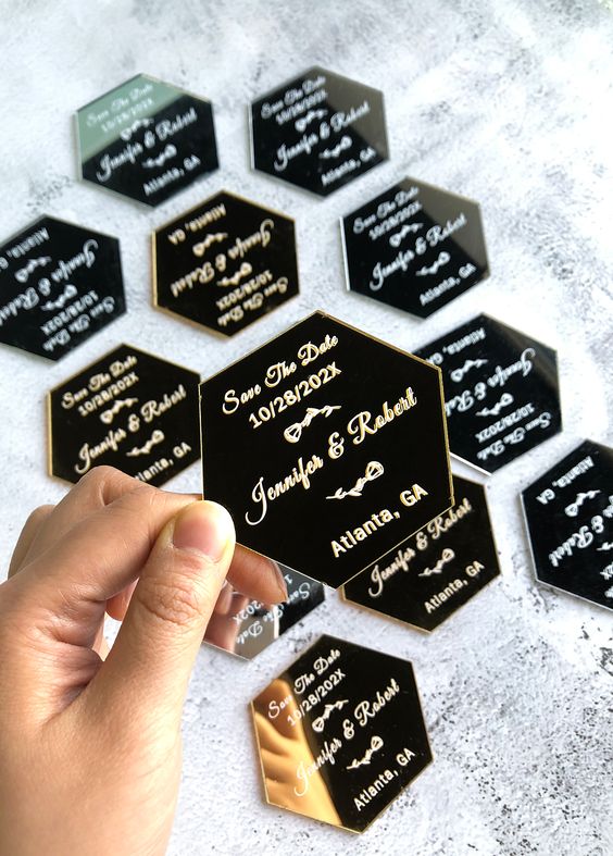 black hexagon magnets with calligraphy are great and ultra-modern save the dates for a modern wedding