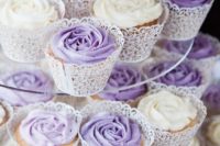 elegant wedding cupcakes with white and purple icing in laser cut liners are very chic and stylish