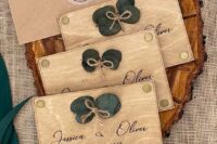 large plywood eucalyptus save the dates with wood bunring and yarn are amazing for a modern rustic wedding