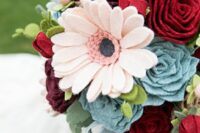 a bold and contrasting wedding bouquet of red, purple, pink felt blooms, felt leaves and succulents is a catchy idea