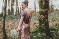 a chic rose gold sequin mermaid wedding dress with a cowl back and a train is a very sophisticated wedding gown