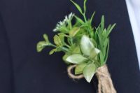 a greenery and white bloom boutonniere with a twine wrap is a simple and natural accent to your look
