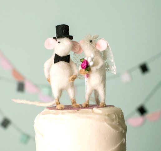 a pretty felt mouse couple dressed as a bride and a groom are lovely wedding cake toppers to try