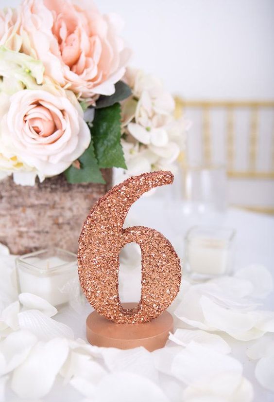 a rose gold wedding table number is a bold and romantic idea to rock