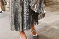 a silver sequin pleated midi skirt will be a nice idea for a party at the wedding