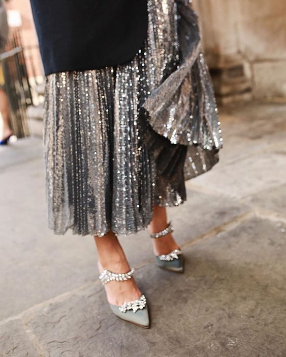 a silver sequin pleated midi skirt will be a nice idea for a party at the wedding