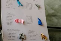 a simple and cool table plan with colorful origami pieces can be easily DIYed and it looks very fun