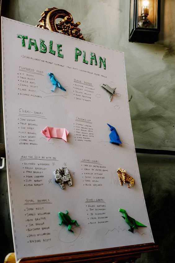 a simple and cool table plan with colorful origami pieces can be easily DIYed and it looks very fun