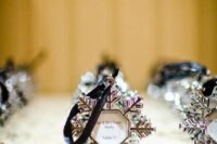 a snowflake-shaped Christmas ornament with your wedding date and names is a lovely idea for a winter wedding