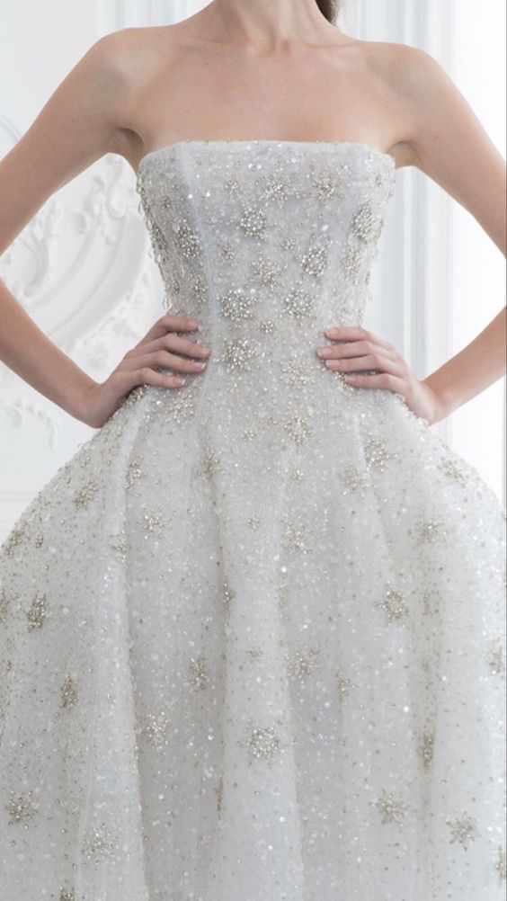 a strapless wedding ballgown with silver rhinestone snowflakes embroidered is a gorgeous idea for a winter wedding