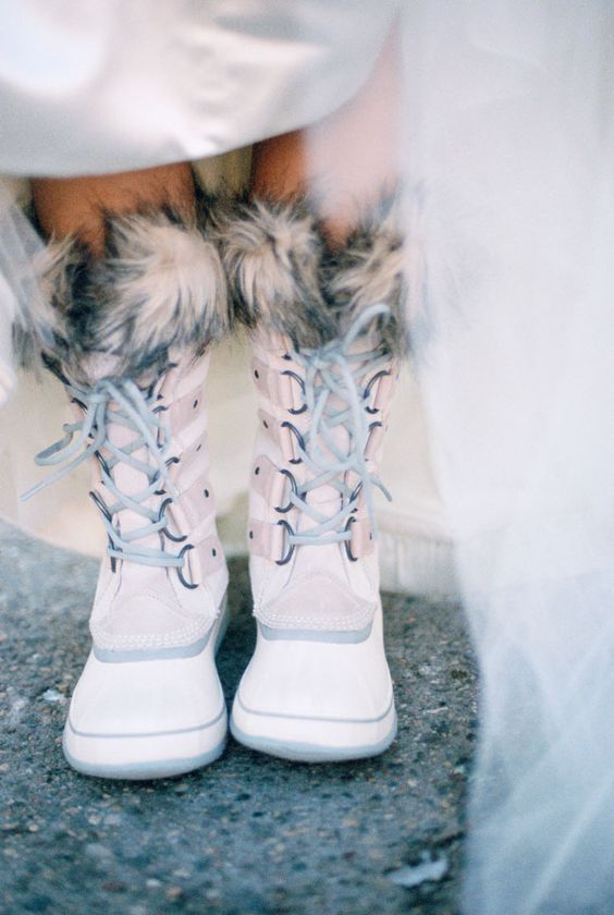 blush faux fur wedding boots are right what you need for a snowy wedding