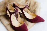 burgundy shoes with cutouts and ties are a great vintage-inspired idea for a winter bride