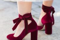 burgundy velvet shoes with ties and bows on the ankles look amazingly girlish and very chic