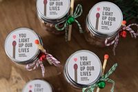 fire starters in jars, with bells, matches and cool stickers are amazing Christmas wedding favors with bright touches
