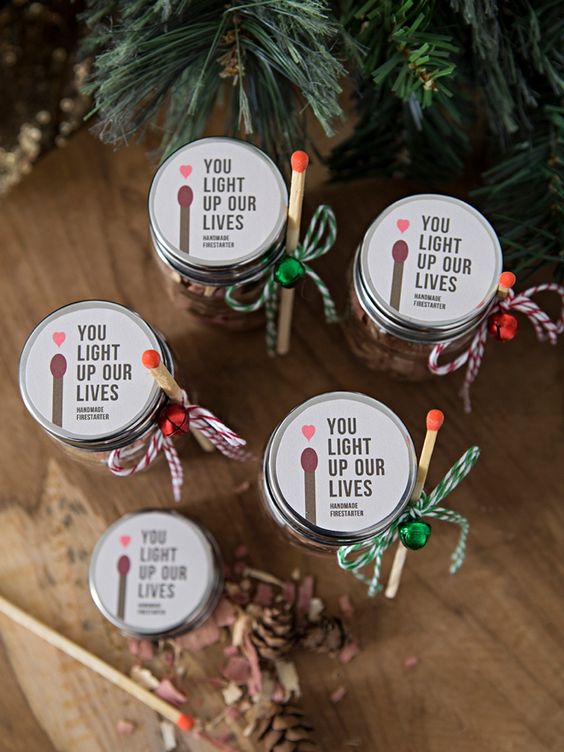 fire starters in jars, with bells, matches and cool stickers are amazing Christmas wedding favors with bright touches
